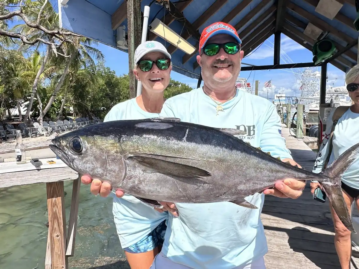 First-time anglers with their catch aboard DirtyBoat in Islamorada