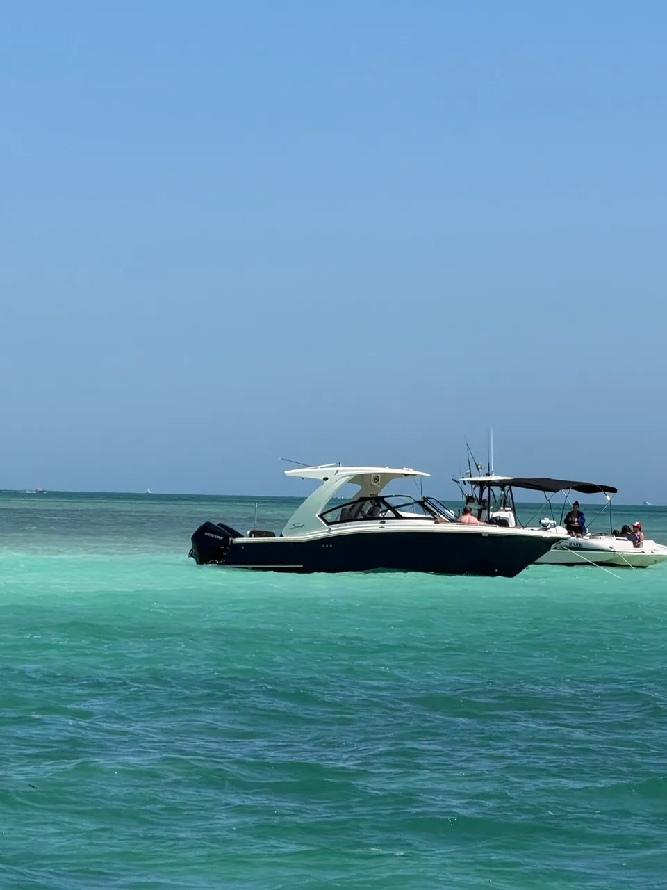 The Bougie Girl — 2023 Scout Dorado at the Islamorada sandbar in crystal clear turquoise water