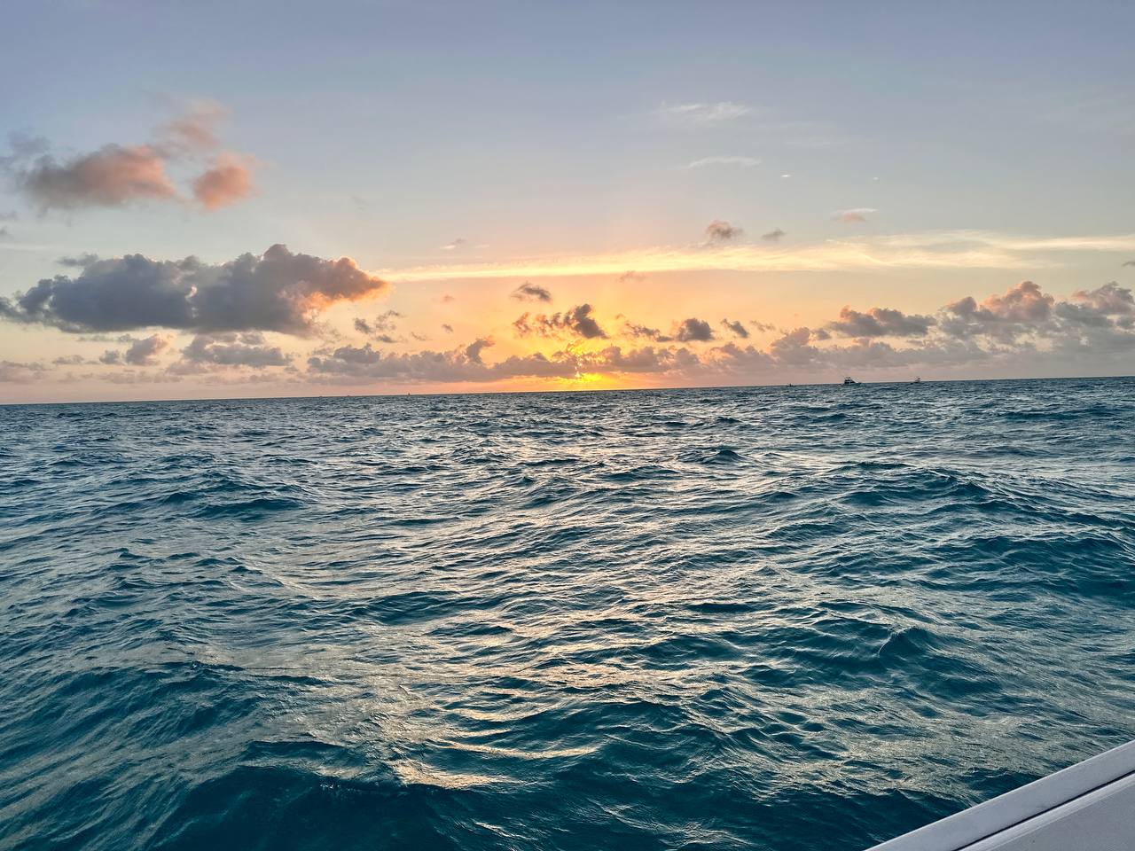 Sunrise over the Atlantic off Islamorada — flat seas and a sharp color change on the horizon