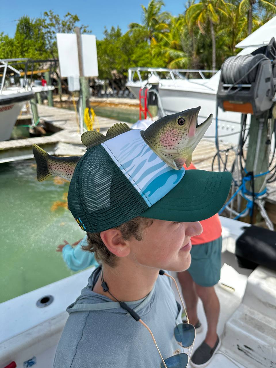 Back at the dock — that hat though