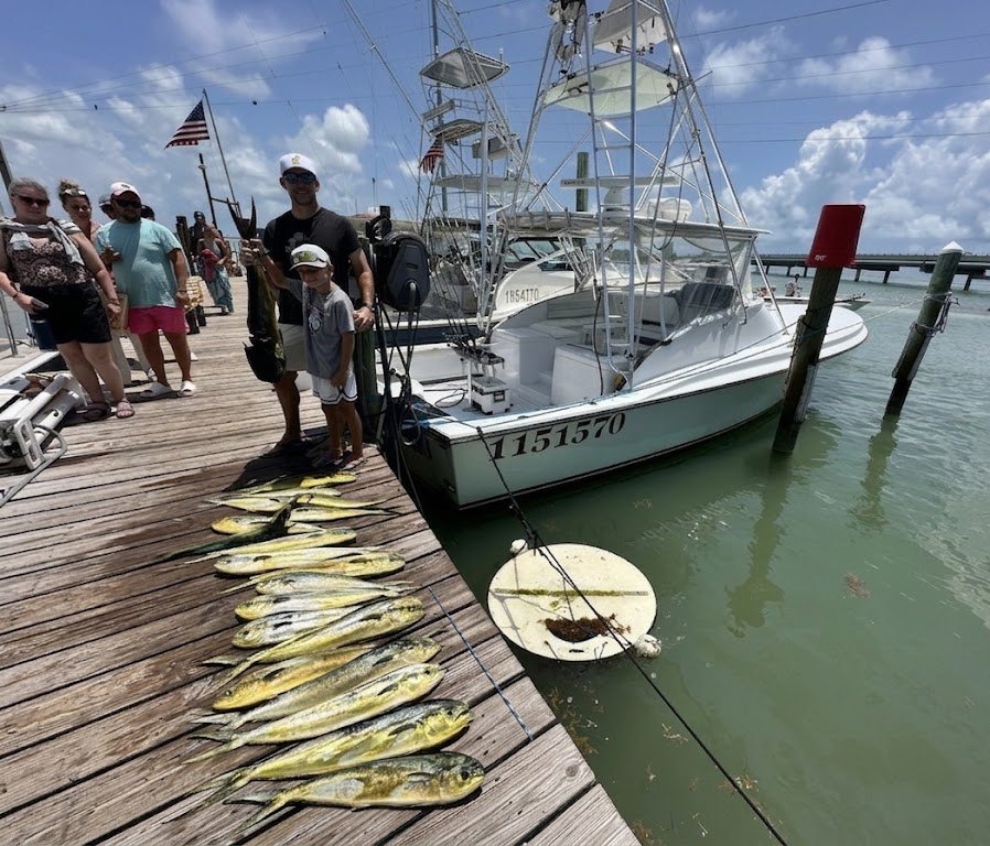 Alec and Gates from Cleveland, Half a Pallet and a Limit of Mahi