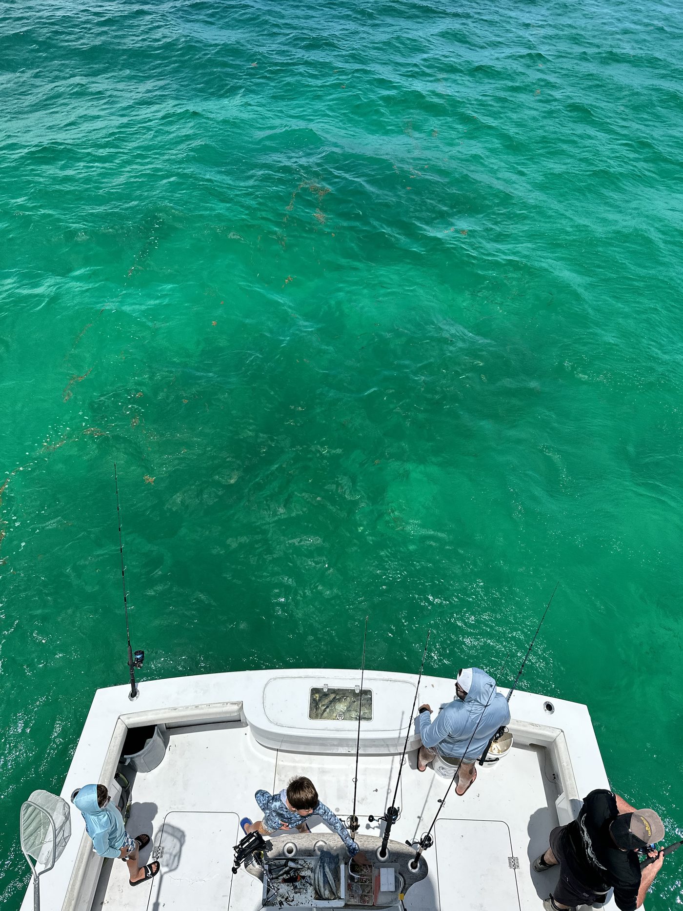 The boys working baits on the bow over a patch reef